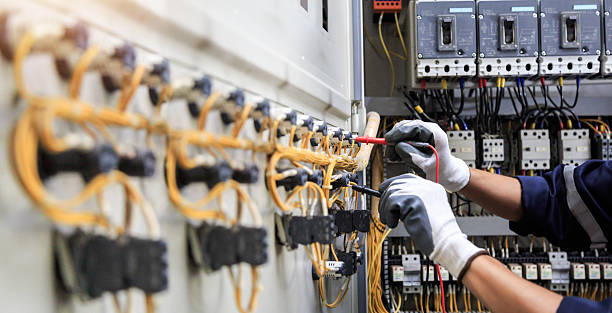 Professional Electrician technician working in Centereach, NY